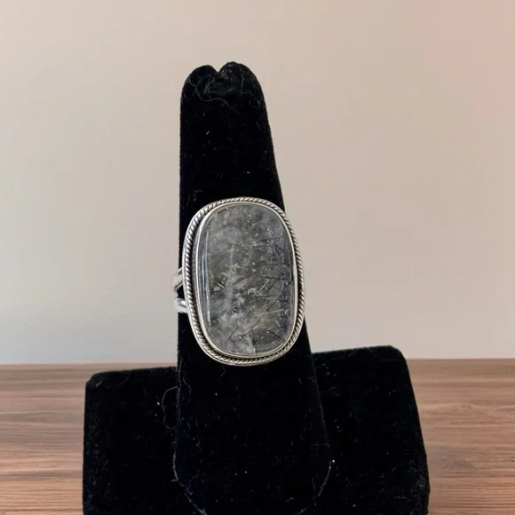 This piece is a black rutilated quartz ring set in sterling silver. Size 8 - Picture 2 of 6